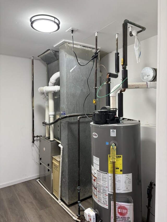 638 Virgil Ave, Elgin, IL 60120 - utility room featuring gas water heater
