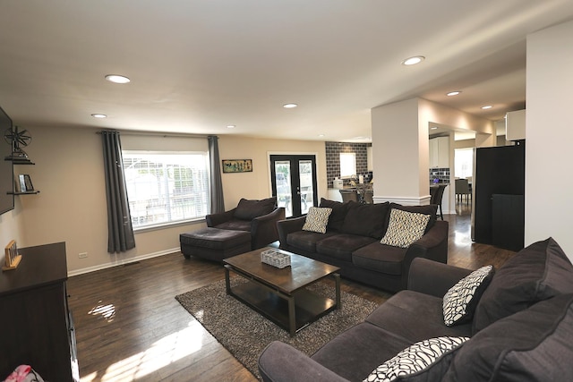 living area with baseboards, recessed lighting, and dark wood-style floors