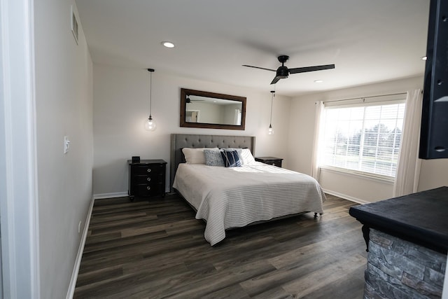 bedroom with baseboards, recessed lighting, dark wood-style flooring, and visible vents