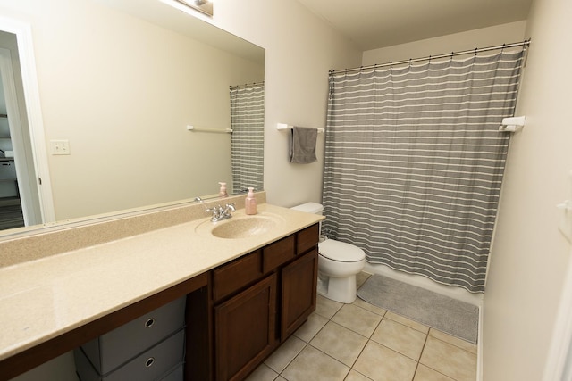 bathroom with tile patterned flooring, a shower with curtain, toilet, and vanity
