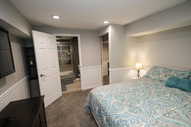bedroom featuring carpet, recessed lighting, and connected bathroom
