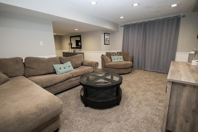 living area featuring recessed lighting and light colored carpet