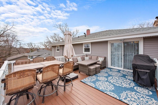 wooden deck with a grill, an outdoor hangout area, and outdoor dining area