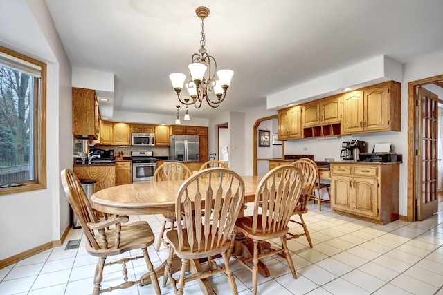 dining space featuring recessed lighting, baseboards, a chandelier, and light tile patterned floors