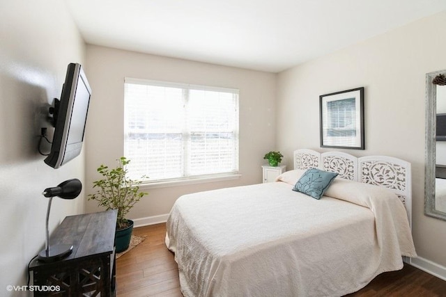204 E Heritage Trl E, Hainesville, IL 60030 - bedroom featuring wood finished floors and baseboards