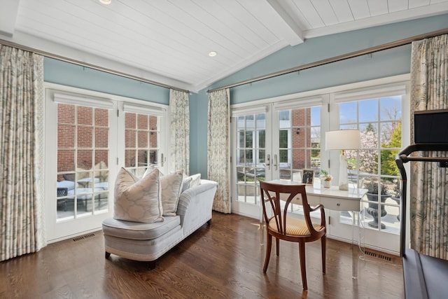 sunroom with visible vents, beam ceiling, and french doors