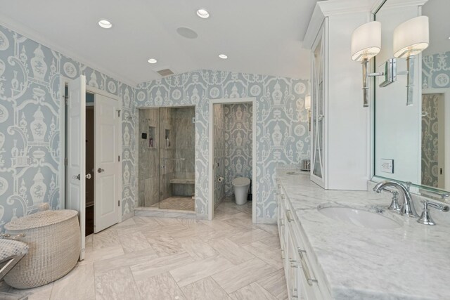 full bath with wallpapered walls, a shower stall, vaulted ceiling, toilet, and vanity