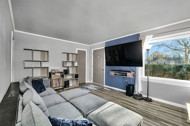 living room with wood finished floors and baseboards