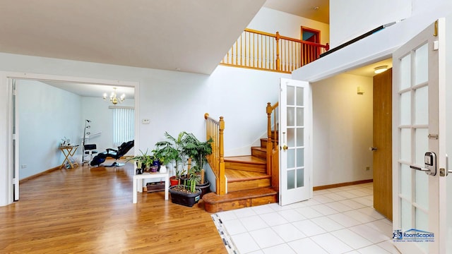 153 Christine Way, Bolingbrook, IL 60440 - interior space featuring baseboards, a chandelier, french doors, stairs, and wood finished floors