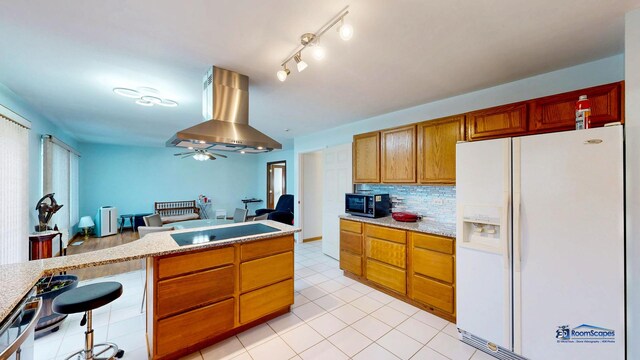 153 Christine Way, Bolingbrook, IL 60440 - kitchen featuring tasteful backsplash, range hood, ceiling fan, brown cabinetry, and black appliances