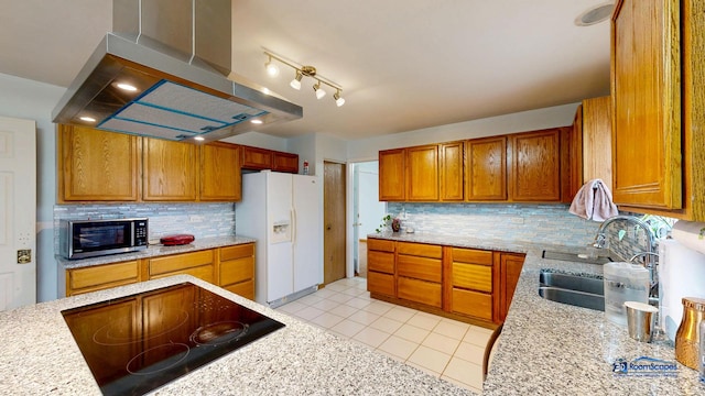 153 Christine Way, Bolingbrook, IL 60440 - kitchen featuring light tile patterned floors, exhaust hood, white fridge with ice dispenser, a sink, and black electric stovetop