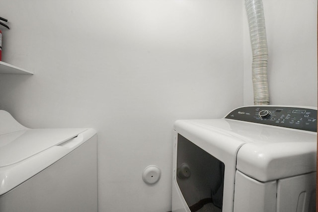 1580 W Sand Bar Ct Unit 1D, Round Lake Beach, IL 60073 - laundry area with washer and clothes dryer