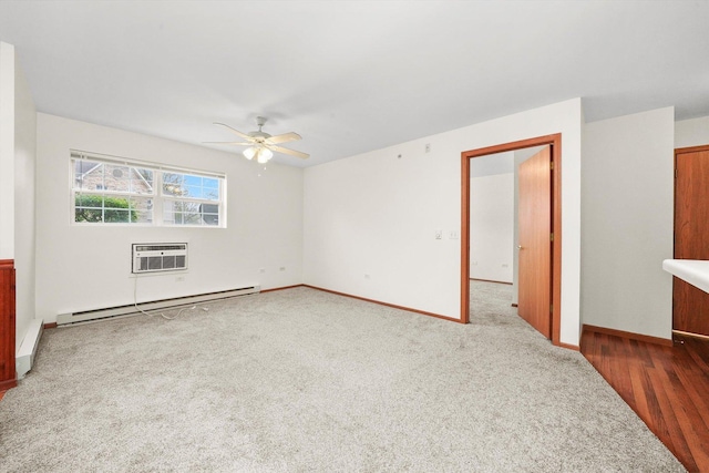 1580 W Sand Bar Ct Unit 1D, Round Lake Beach, IL 60073 - carpeted spare room with a baseboard heating unit, an AC wall unit, ceiling fan, and baseboards