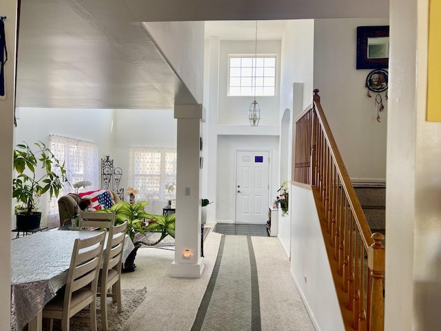 370 W Asbury Dr, Round Lake, IL 60073 - entryway with carpet, a high ceiling, and stairway