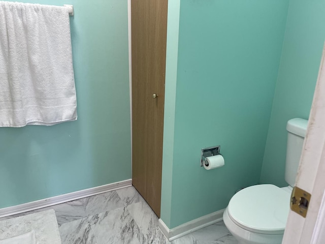 370 W Asbury Dr, Round Lake, IL 60073 - bathroom featuring marble finish flooring, toilet, and baseboards