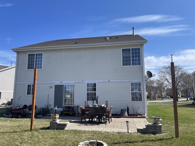 370 W Asbury Dr, Round Lake, IL 60073 - back of house with a yard, a patio area, and entry steps