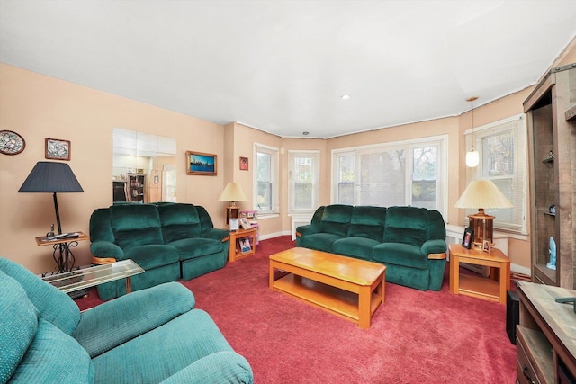 carpeted living room featuring baseboards