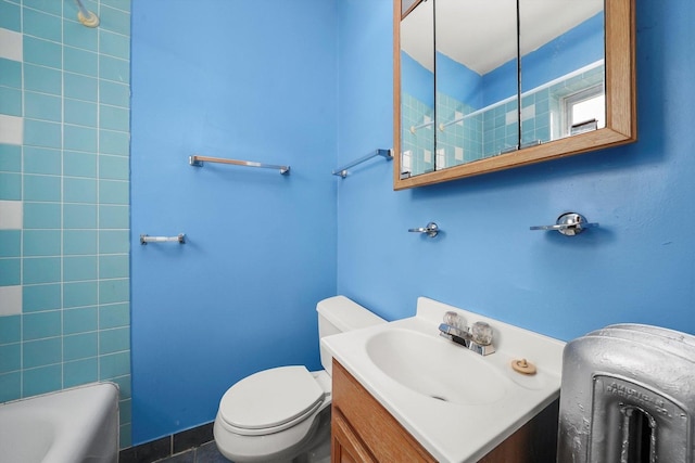 full bath with vanity, bathtub / shower combination, and toilet