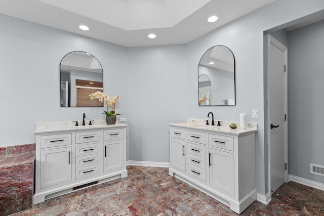 318 Camelot Ln, Libertyville, IL 60048 - bathroom with recessed lighting, baseboards, and two vanities