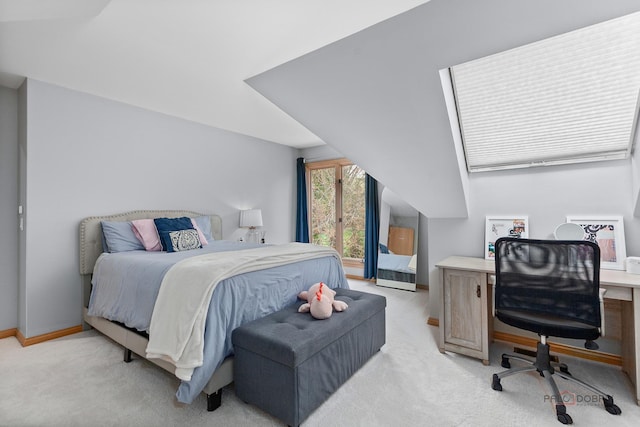 318 Camelot Ln, Libertyville, IL 60048 - bedroom with light carpet, an office area, baseboards, and lofted ceiling