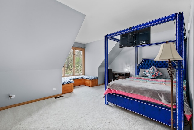 318 Camelot Ln, Libertyville, IL 60048 - carpeted bedroom featuring vaulted ceiling and baseboards