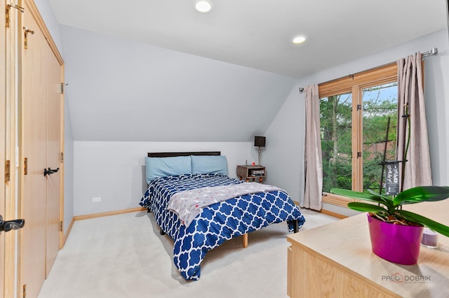 318 Camelot Ln, Libertyville, IL 60048 - bedroom featuring lofted ceiling, recessed lighting, light colored carpet, and baseboards
