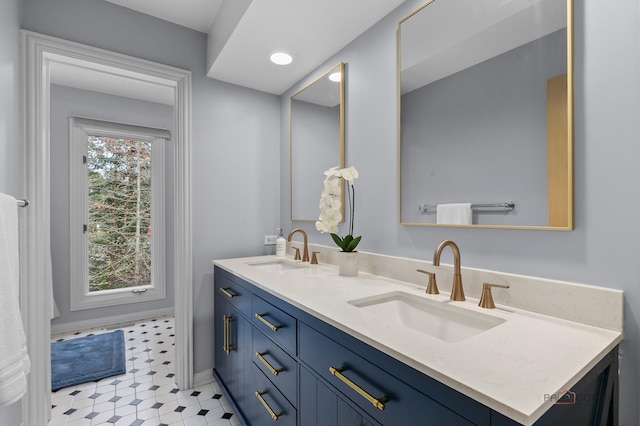 318 Camelot Ln, Libertyville, IL 60048 - full bath featuring double vanity and baseboards