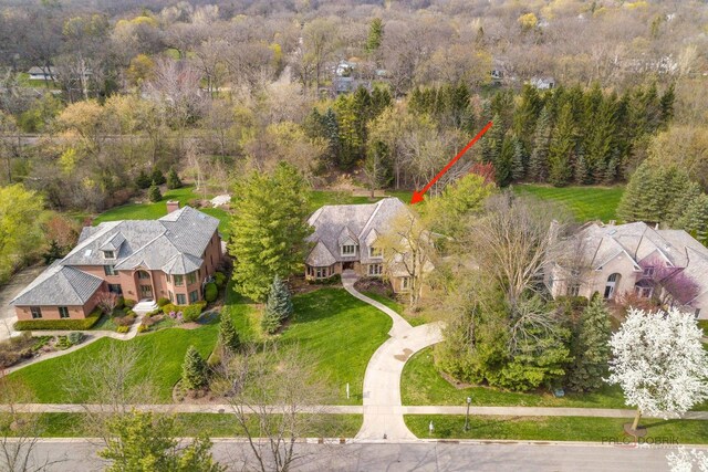 aerial view with a wooded view