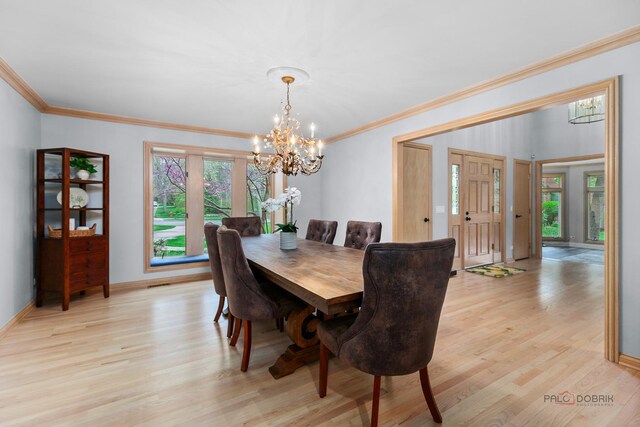living area with a healthy amount of sunlight, high vaulted ceiling, light wood-type flooring, and a stone fireplace