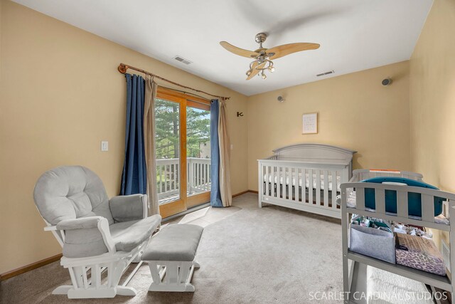 bedroom featuring baseboards, carpet flooring, and visible vents