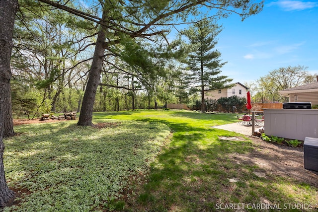 view of yard with fence and a patio area