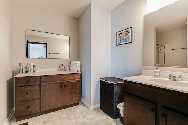 full bathroom featuring vanity and baseboards