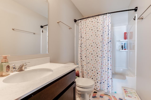 bathroom with toilet and vanity
