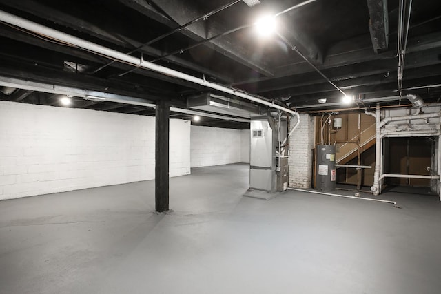 412 N Center Ave, Bradley, IL 60915 - unfinished basement with electric water heater and heating unit