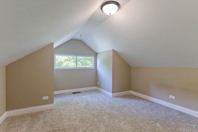 7614 S Chappel Ave, Chicago, IL 60649 - bonus room featuring carpet flooring, baseboards, lofted ceiling, and visible vents