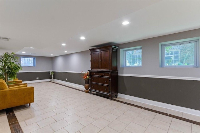 7614 S Chappel Ave, Chicago, IL 60649 - living area featuring light tile patterned floors, baseboards, visible vents, and recessed lighting