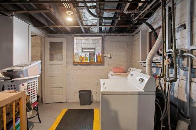 laundry room featuring laundry area and washing machine and dryer