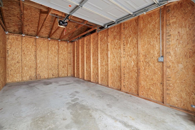 1520 W Sand Bar Ct Unit 1B, Round Lake Beach, IL 60073 - garage featuring a garage door opener