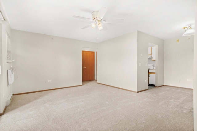 1520 W Sand Bar Ct Unit 1B, Round Lake Beach, IL 60073 - unfurnished bedroom featuring a ceiling fan, baseboards, and light colored carpet