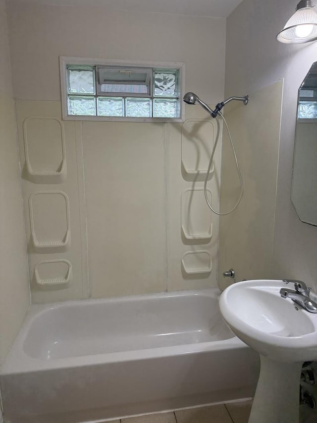 full bathroom featuring tile patterned floors and shower / tub combination