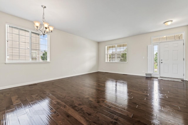282 Willington Way, Oswego, IL 60543 - entrance foyer featuring a chandelier, hardwood / wood-style floors, and baseboards