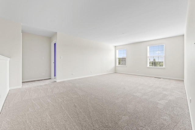 282 Willington Way, Oswego, IL 60543 - carpeted spare room with baseboards
