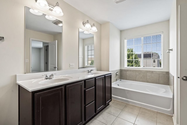 282 Willington Way, Oswego, IL 60543 - bathroom with tile patterned floors, a garden tub, and double vanity