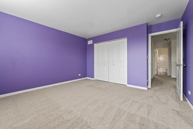 282 Willington Way, Oswego, IL 60543 - unfurnished bedroom with carpet floors, baseboards, and a closet