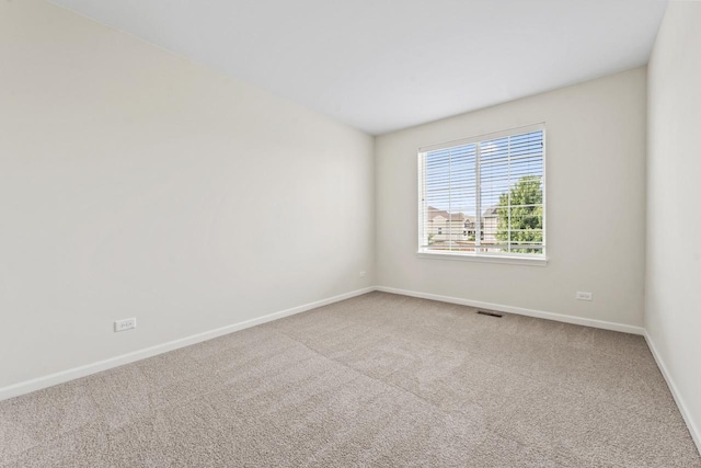 282 Willington Way, Oswego, IL 60543 - spare room with baseboards and carpet