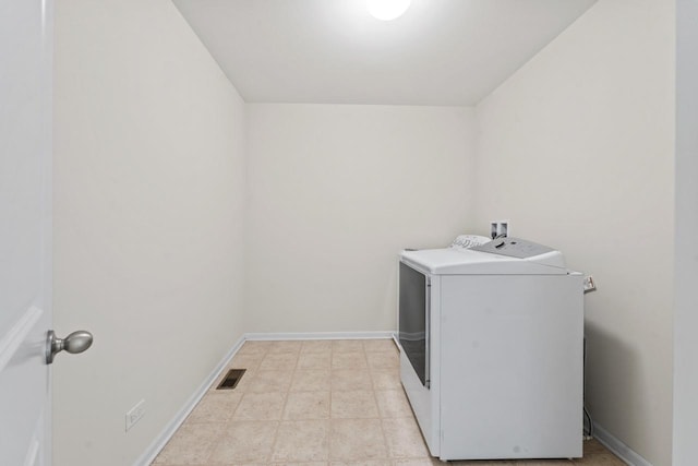 282 Willington Way, Oswego, IL 60543 - washroom with baseboards and washing machine and dryer
