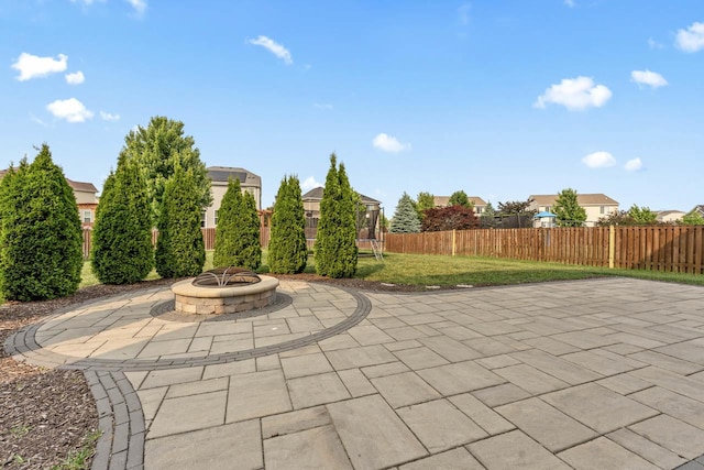282 Willington Way, Oswego, IL 60543 - view of patio with an outdoor fire pit and a trampoline