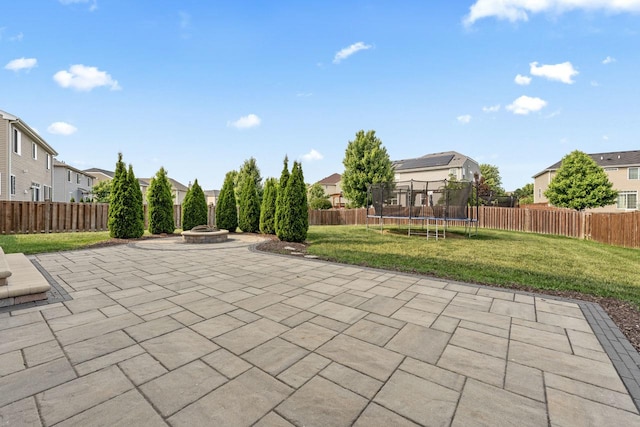 282 Willington Way, Oswego, IL 60543 - view of patio / terrace with a fire pit, a residential view, and a trampoline