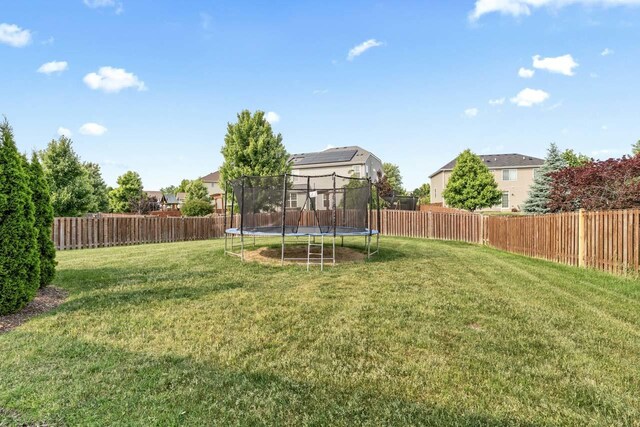 282 Willington Way, Oswego, IL 60543 - view of yard featuring a trampoline and a residential view