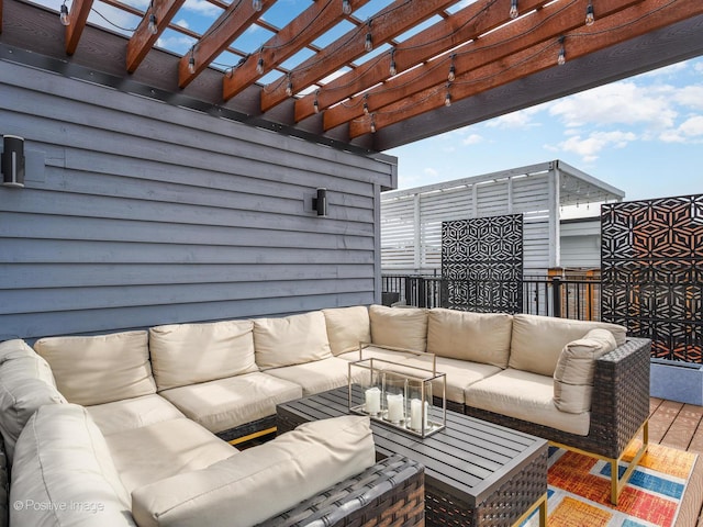 view of patio with an outdoor living space and a pergola